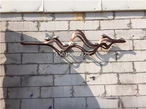 匠心雕琢 售樓部戶外不銹鋼藝術(shù)背景墻，激光圍邊與手工鍛造的藝術(shù)對話